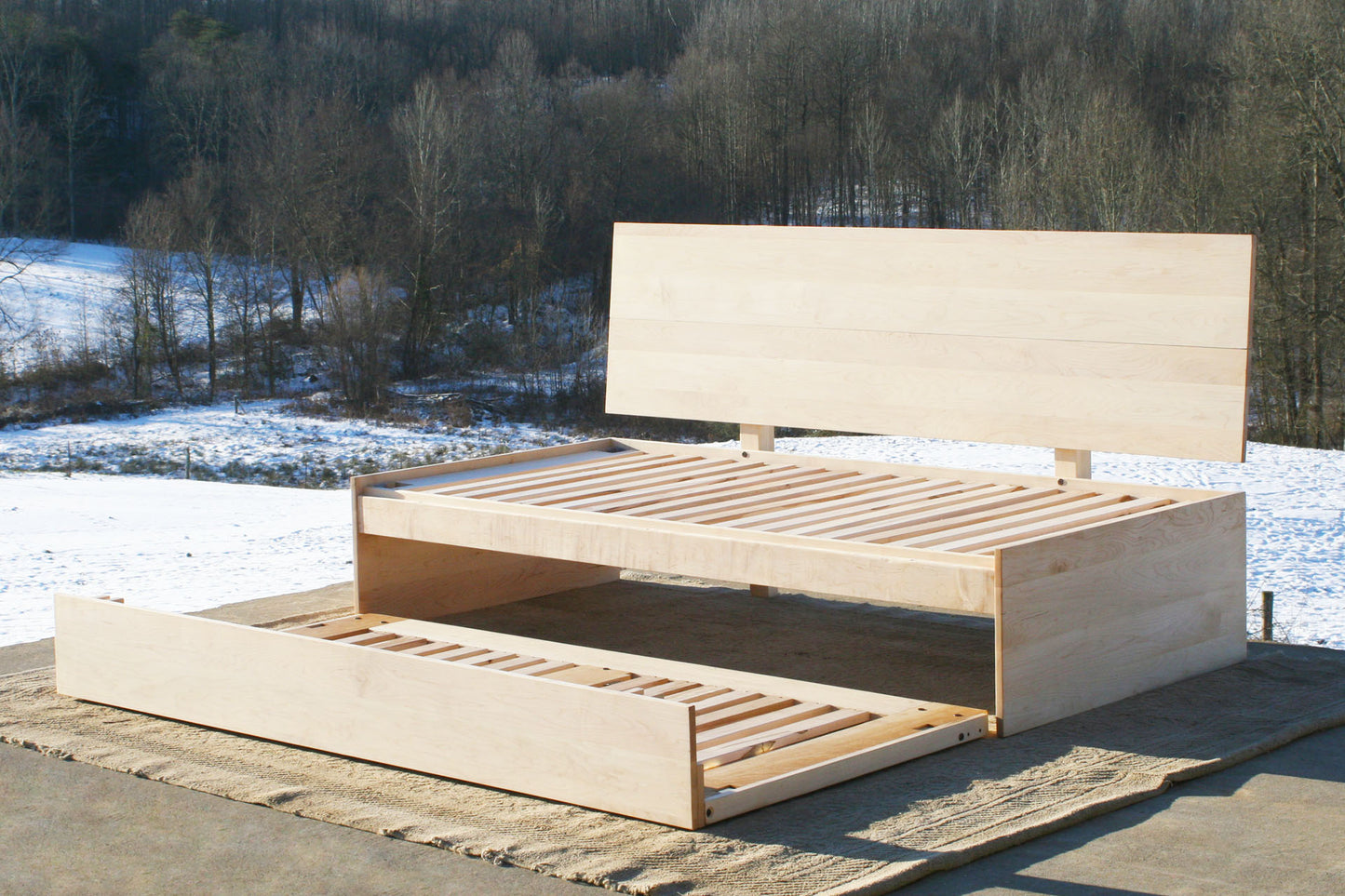 angled view daybed with pop up trundle