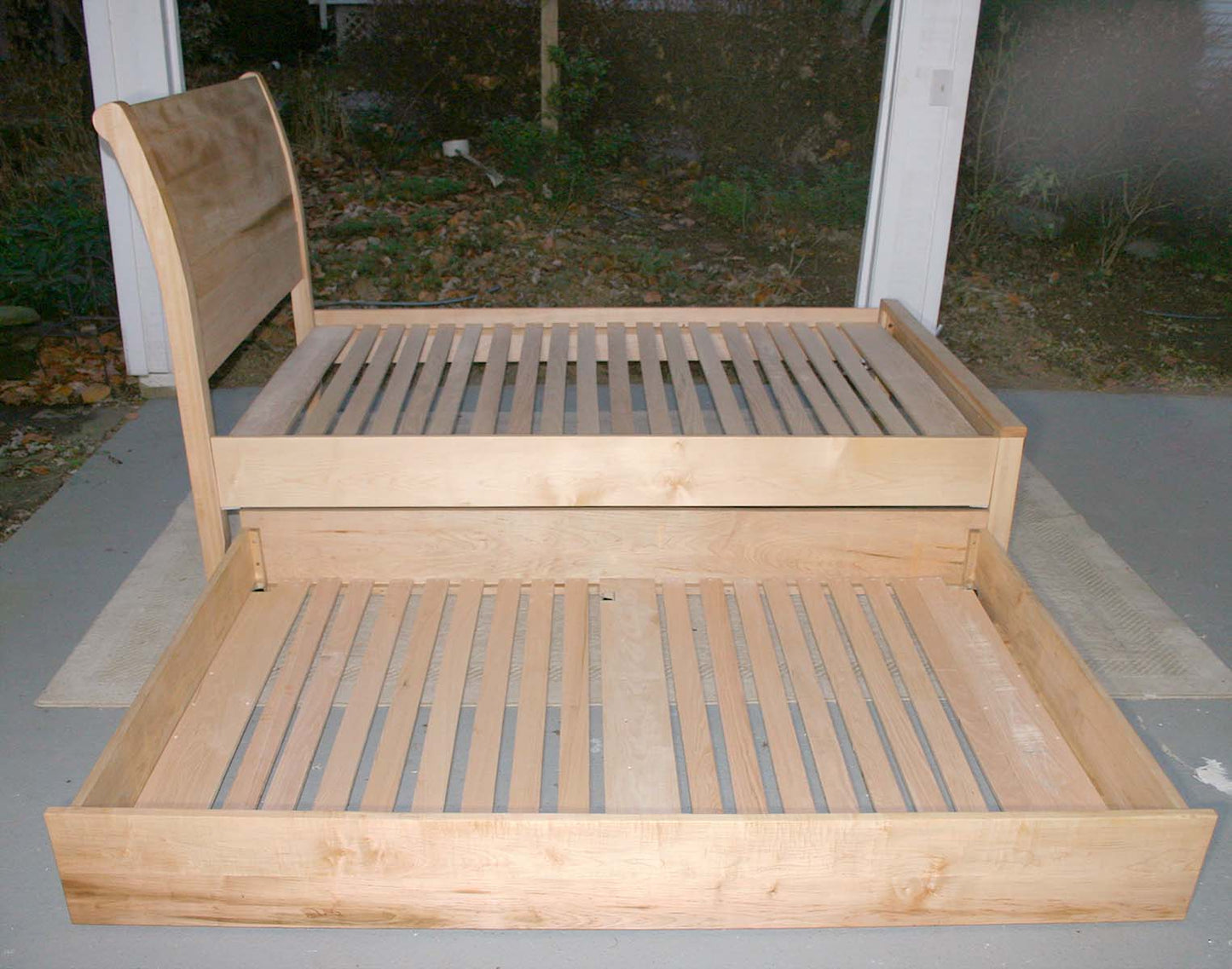 side view Sleigh Bed with trundle out