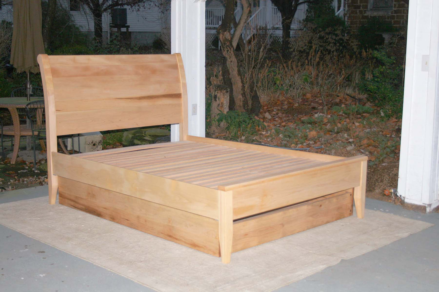 angled view Sleigh Bed with trundle