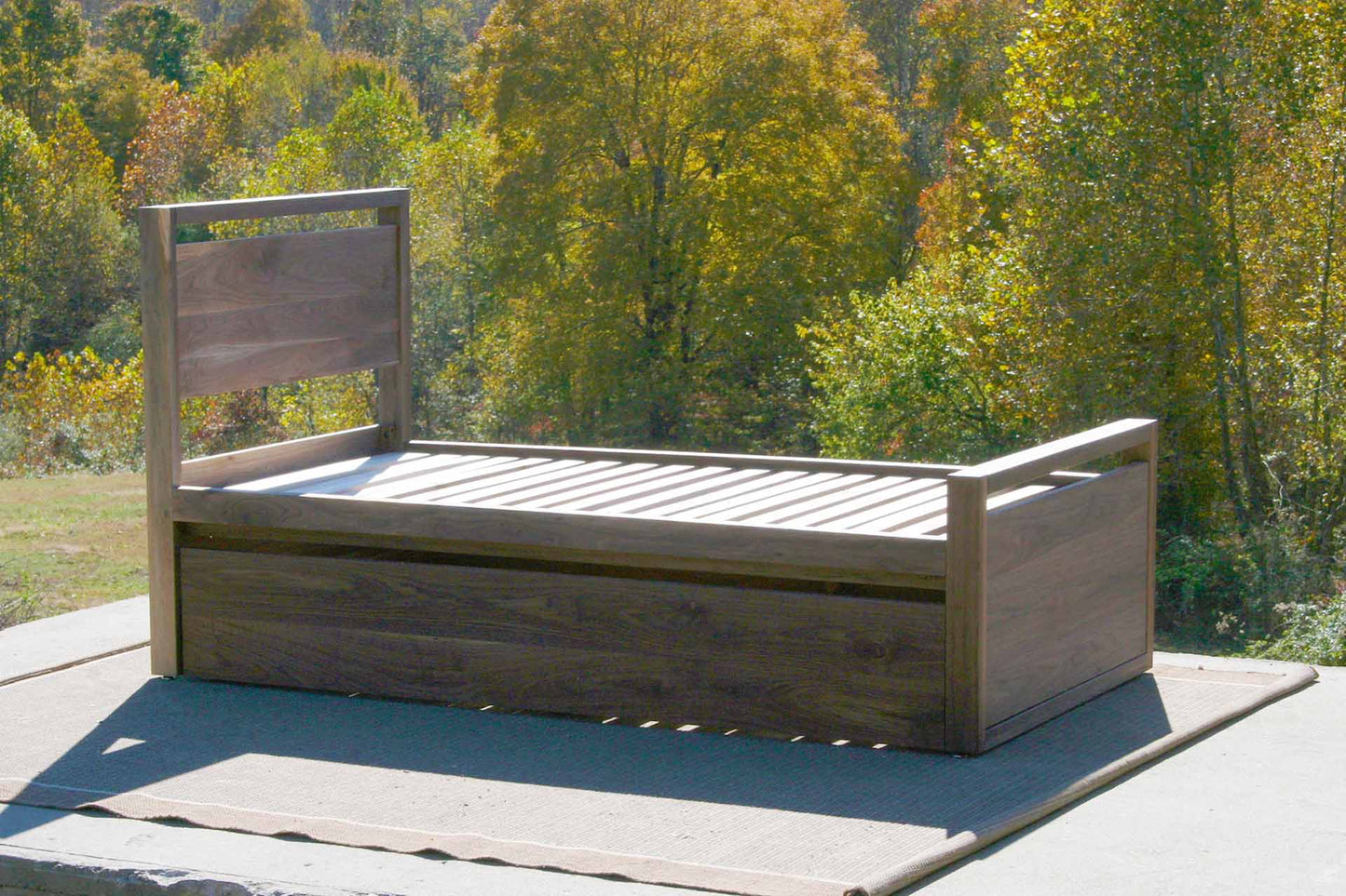 side view Trundle Bed with top rails on headboard and footboard