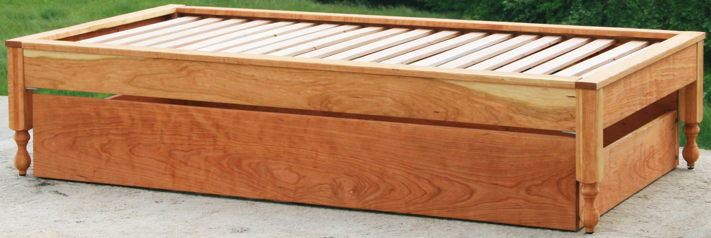 close up angled view Trundle bed with platform top cap trim