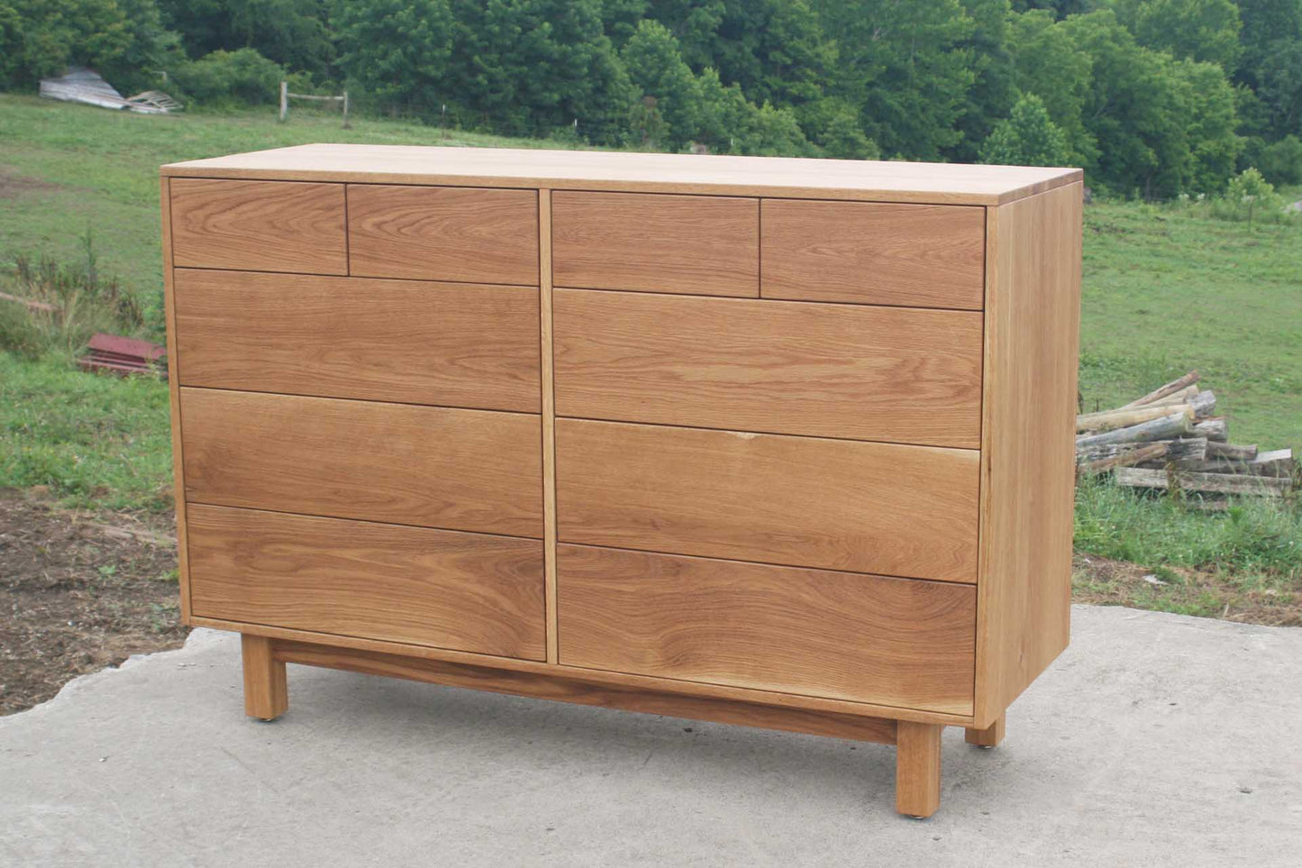 angled view 10 drawer dresser side view natural