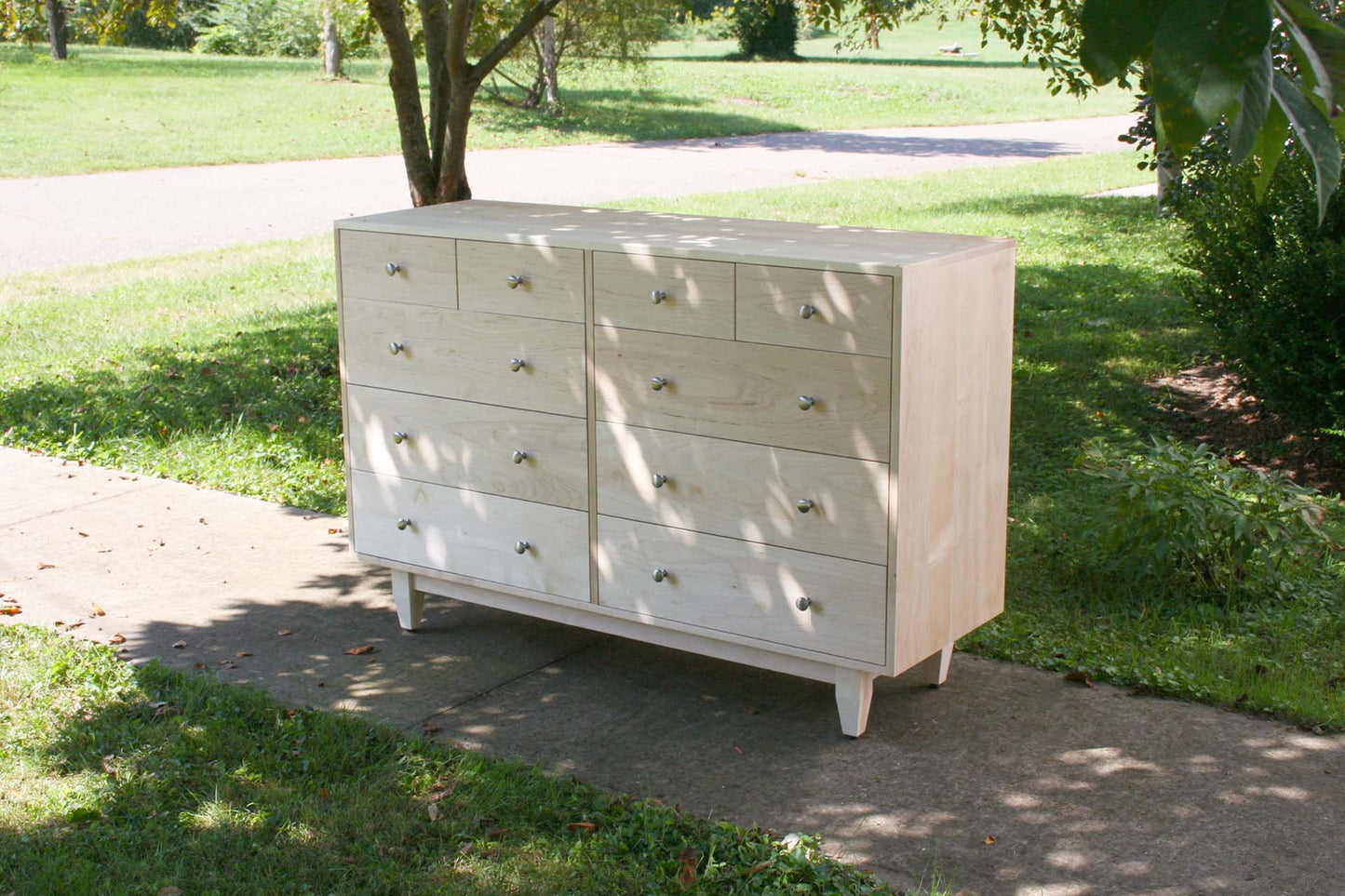 angled view 10 drawer mid century modern dresser