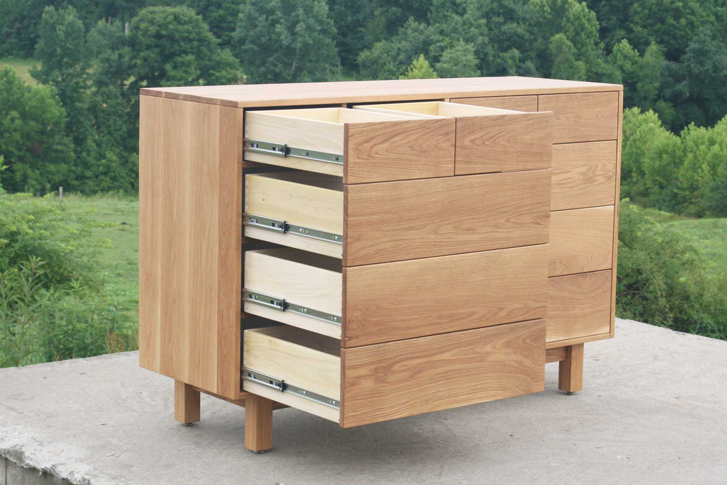 right drawers open 10 drawer dresser side view natural angled view