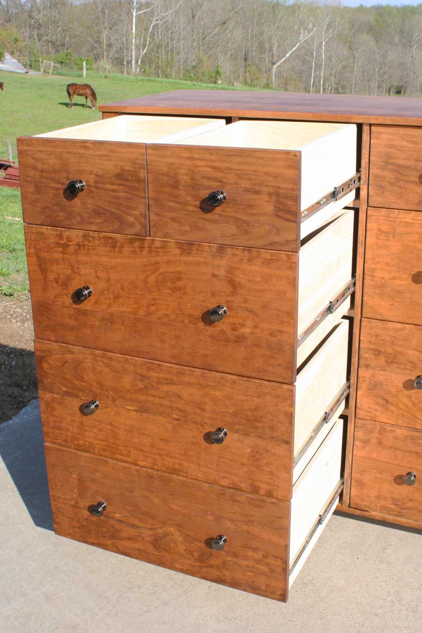 cherry wood dresser drawers open