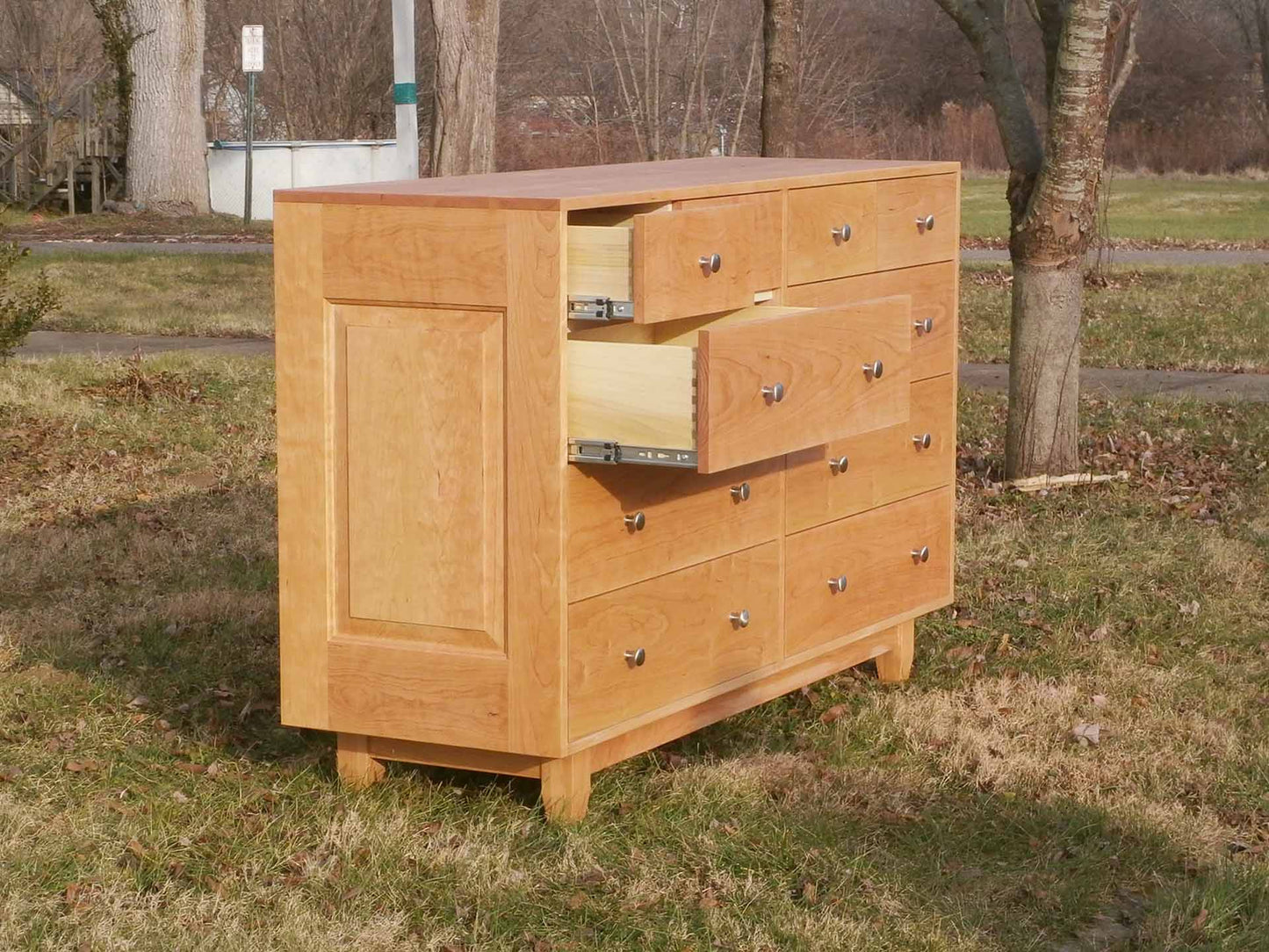 big dresser with open drawers side view