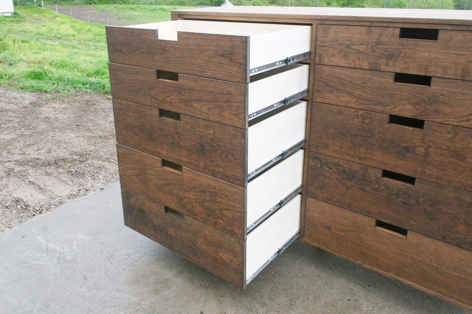 10 drawer dresser walnut with drawers open angled view