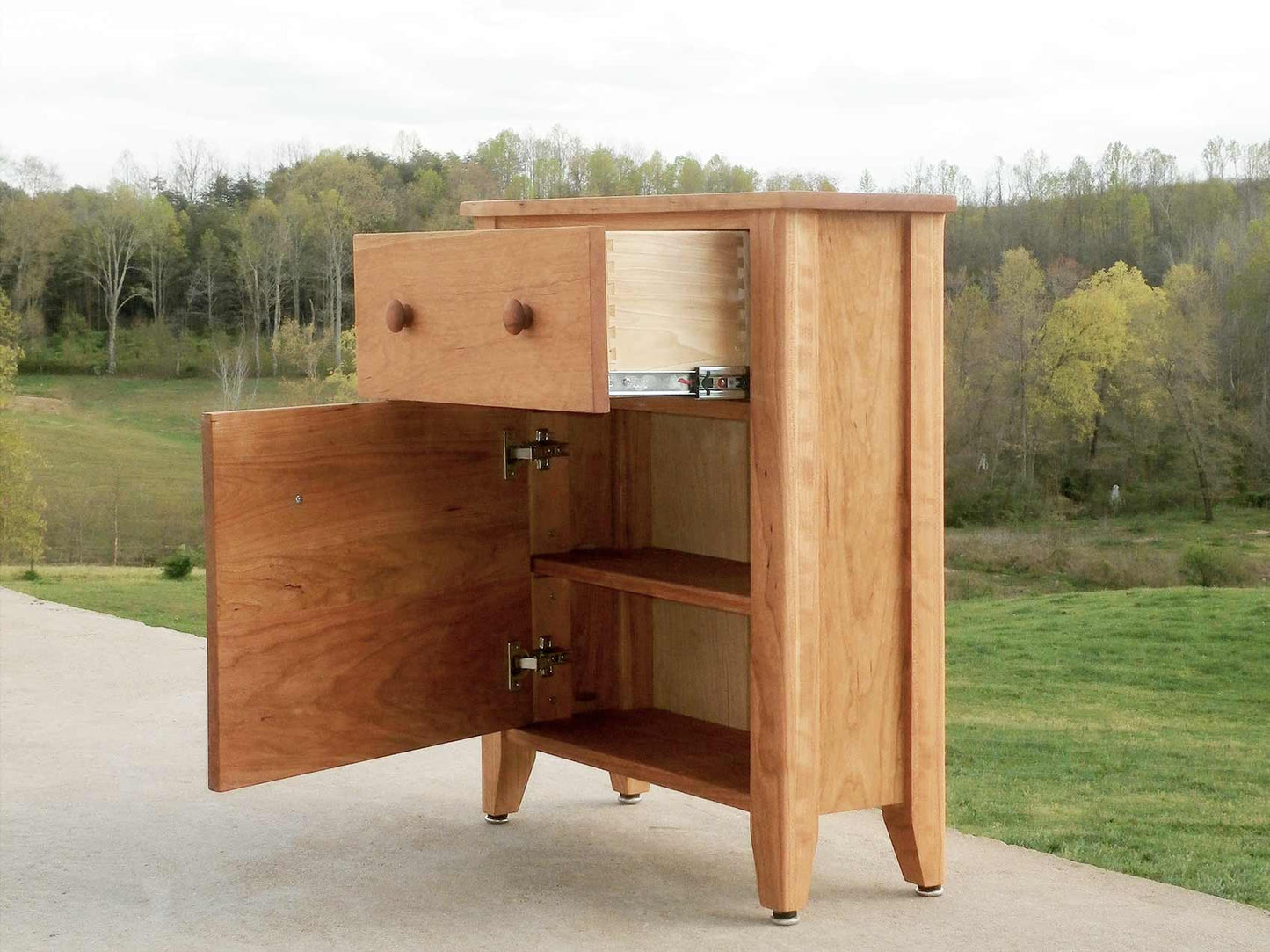 hallway cabinet side view all storage slots open