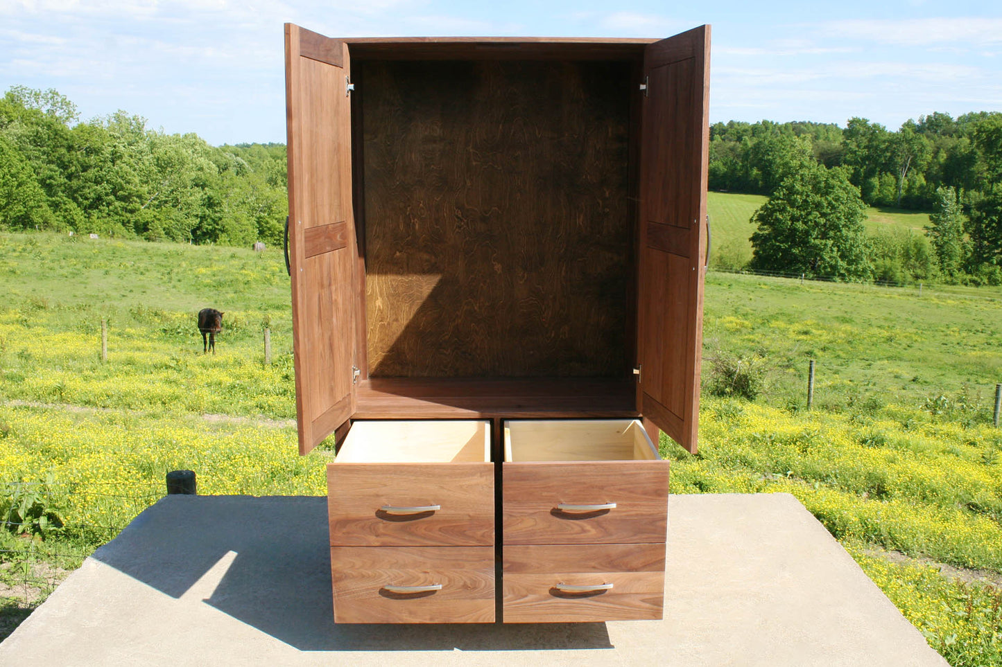 Armoire with 2 Doors open and 4 Drawers front view