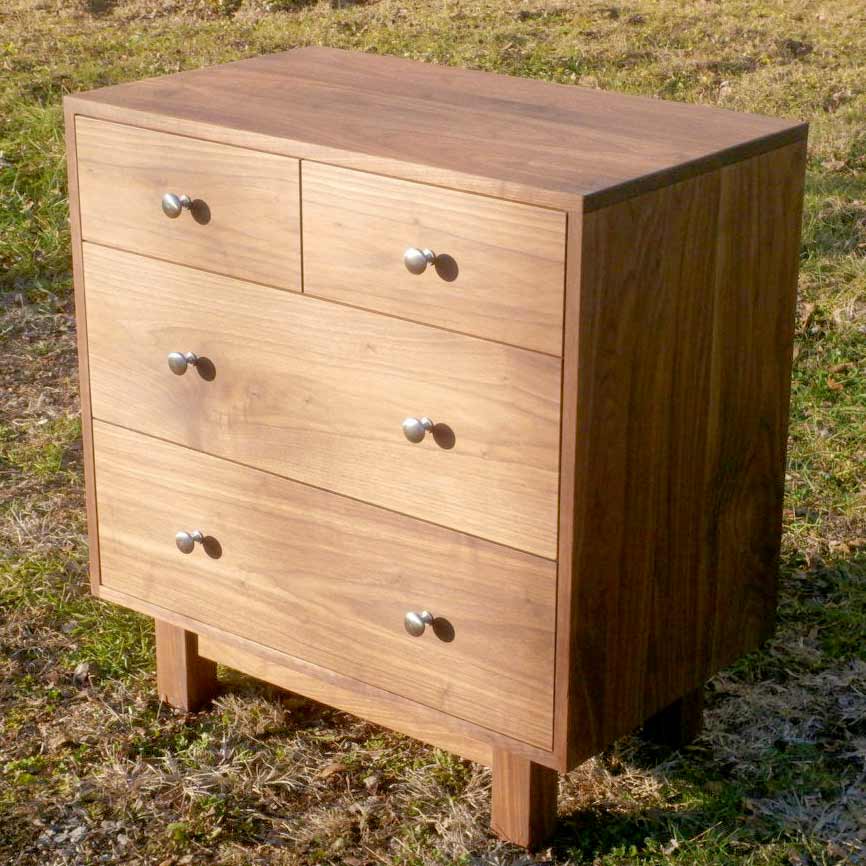 small dresser with 4 drawers angled view hardwood