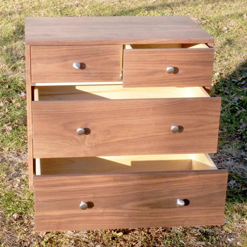 small dresser with 4 drawers some drawers open