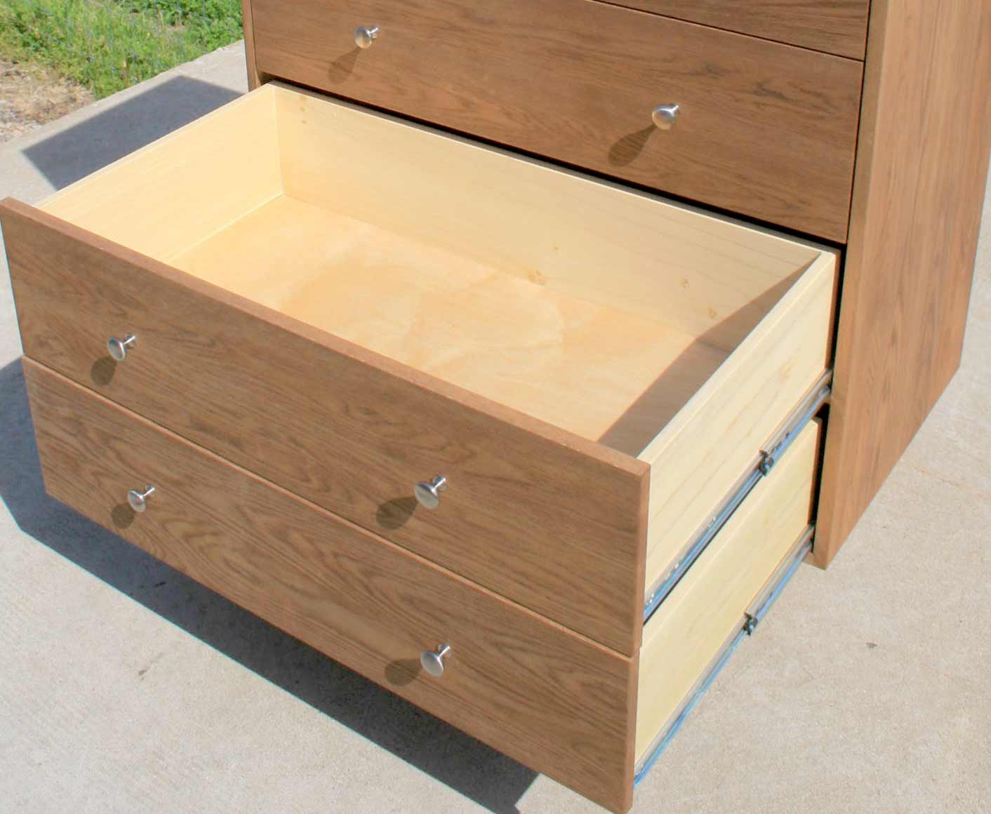 open bottom drawers of Tall 5 drawer dresser