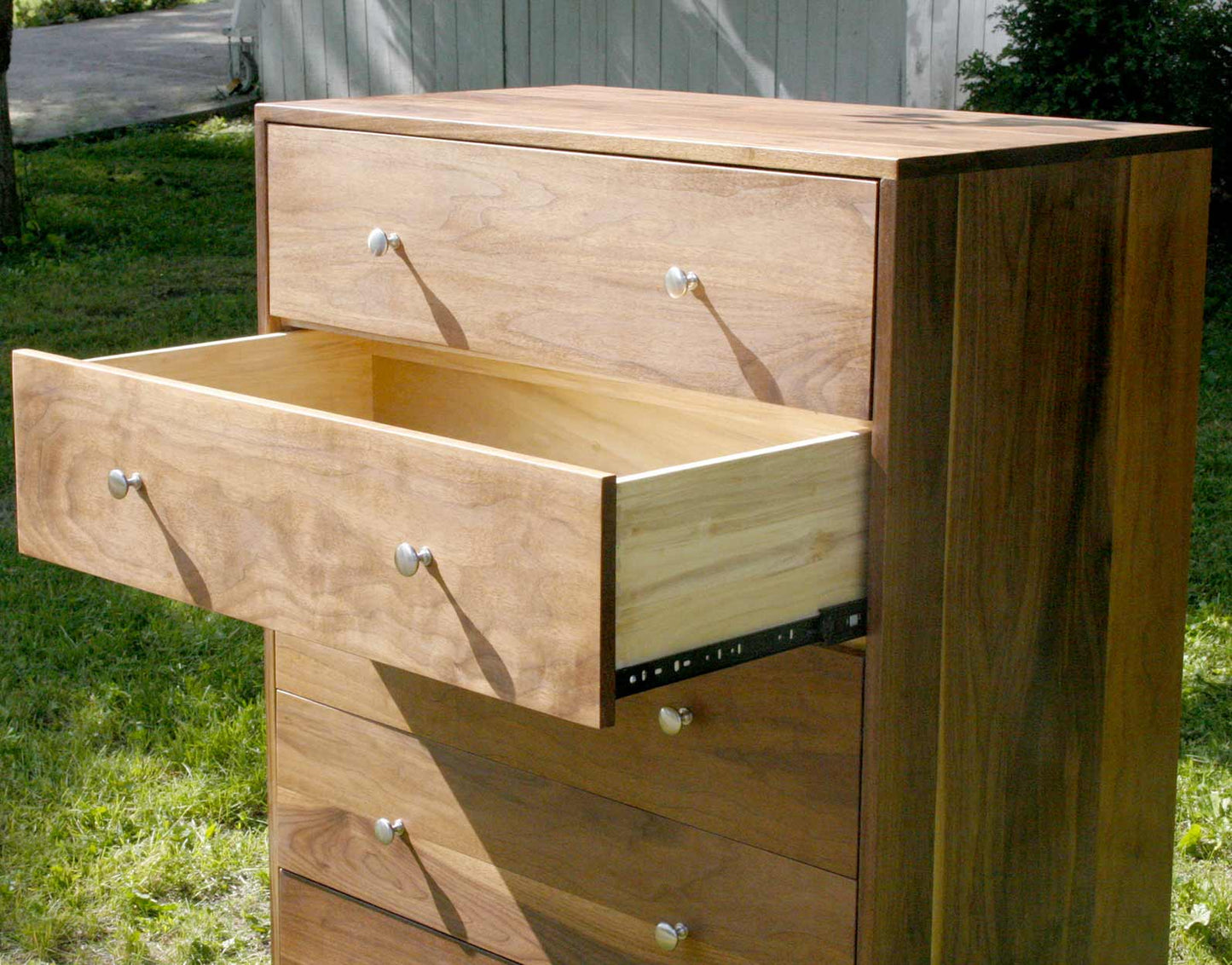 mid shot Tall 5 drawer dresser with drawer open