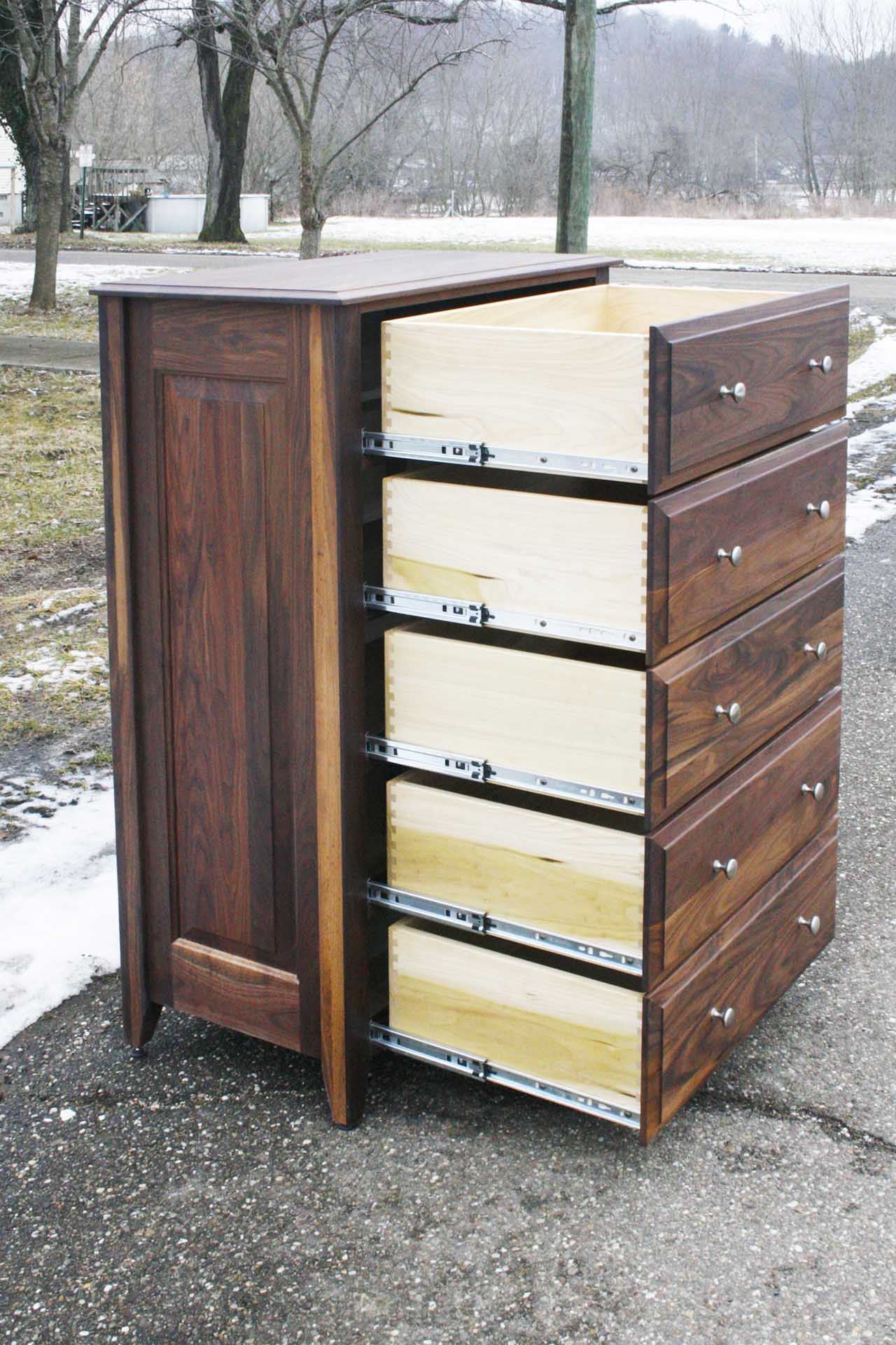 side view walnut chest of 5 drawers with drawers open