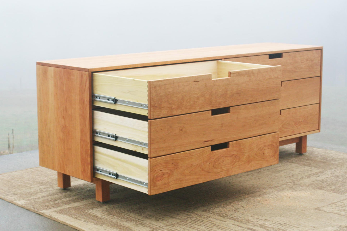 6 drawer double dresser with inset drawers that are open angled view