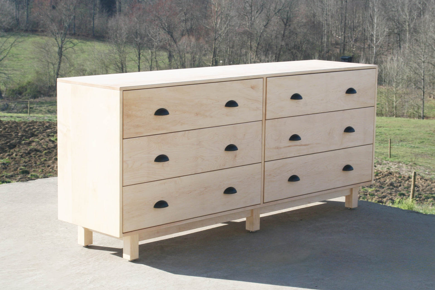 angled view 6 drawer double dresser with inset drawers