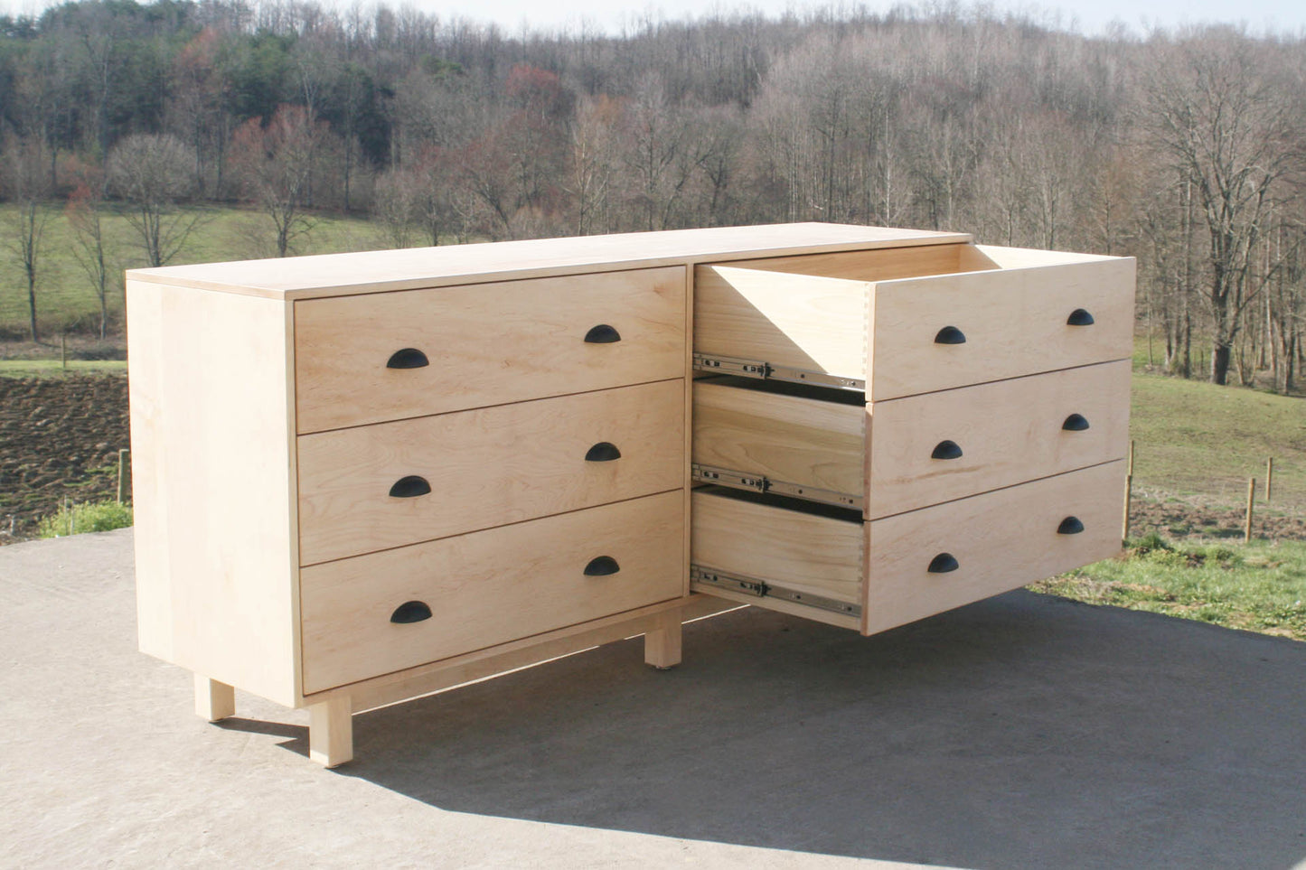6 drawer double dresser with inset drawers and three drawers open angled view