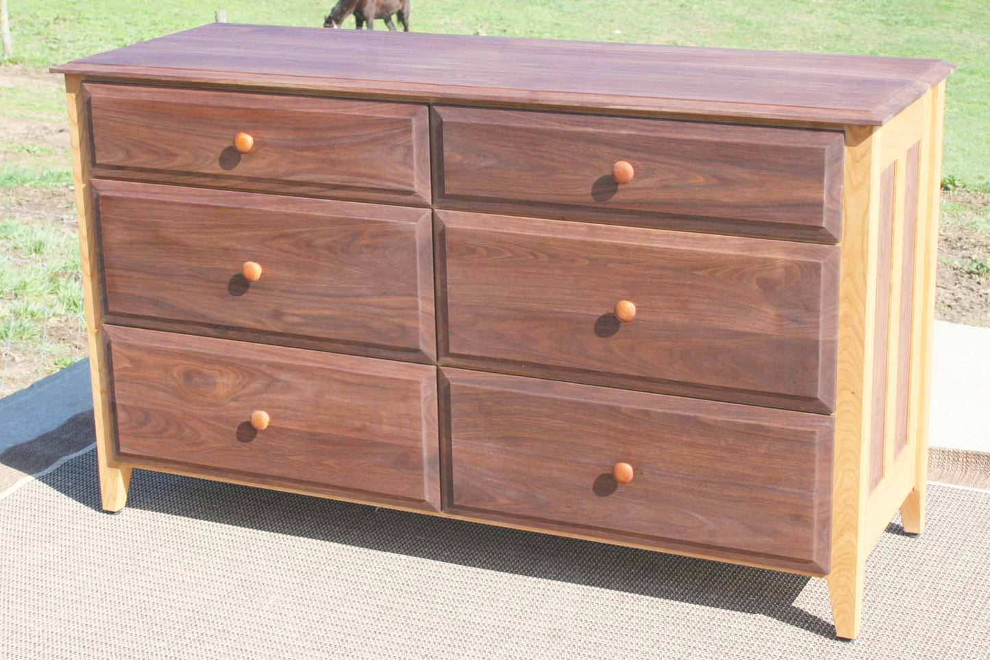angle view solid natural hardwood dresser with wood handles