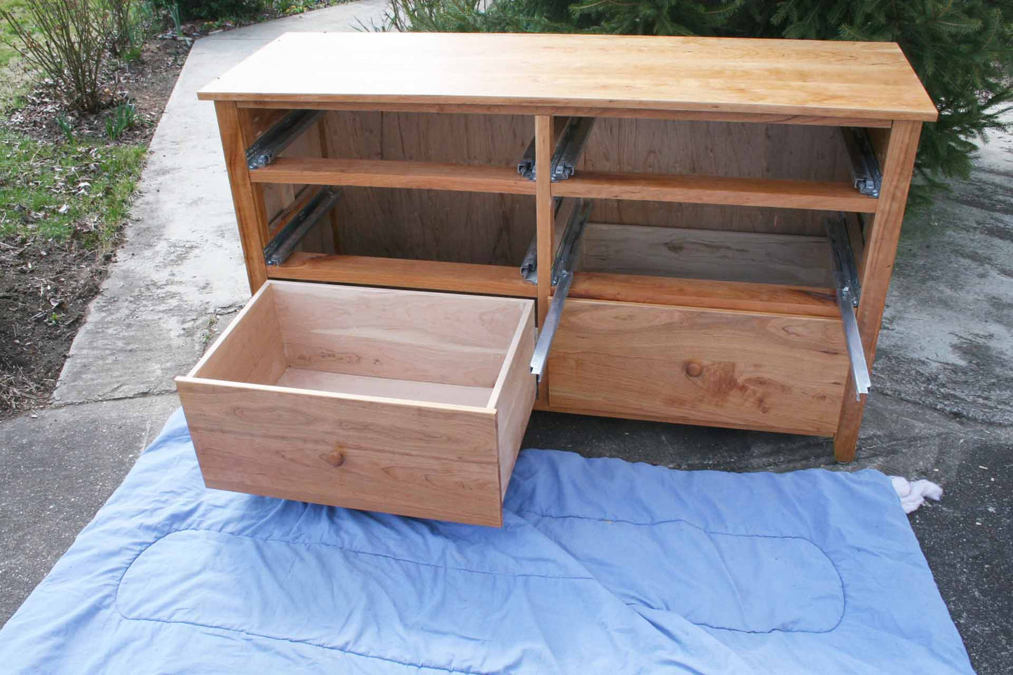 disassembled 6 drawer hardwood dresser without most drawers