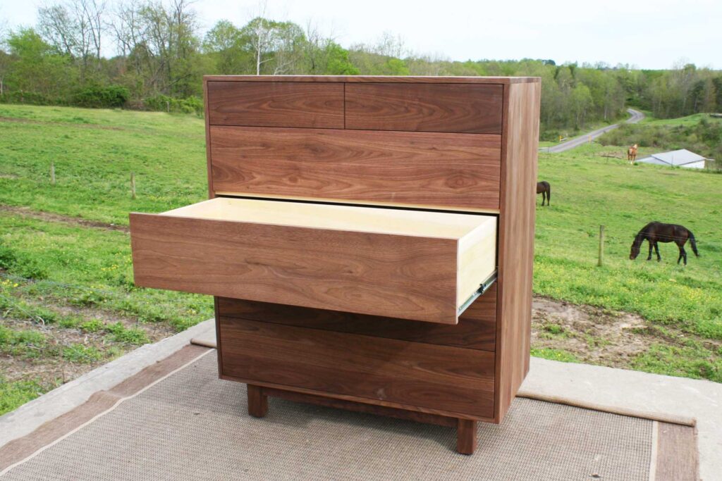 6 drawer dresser with drawer open in walnut