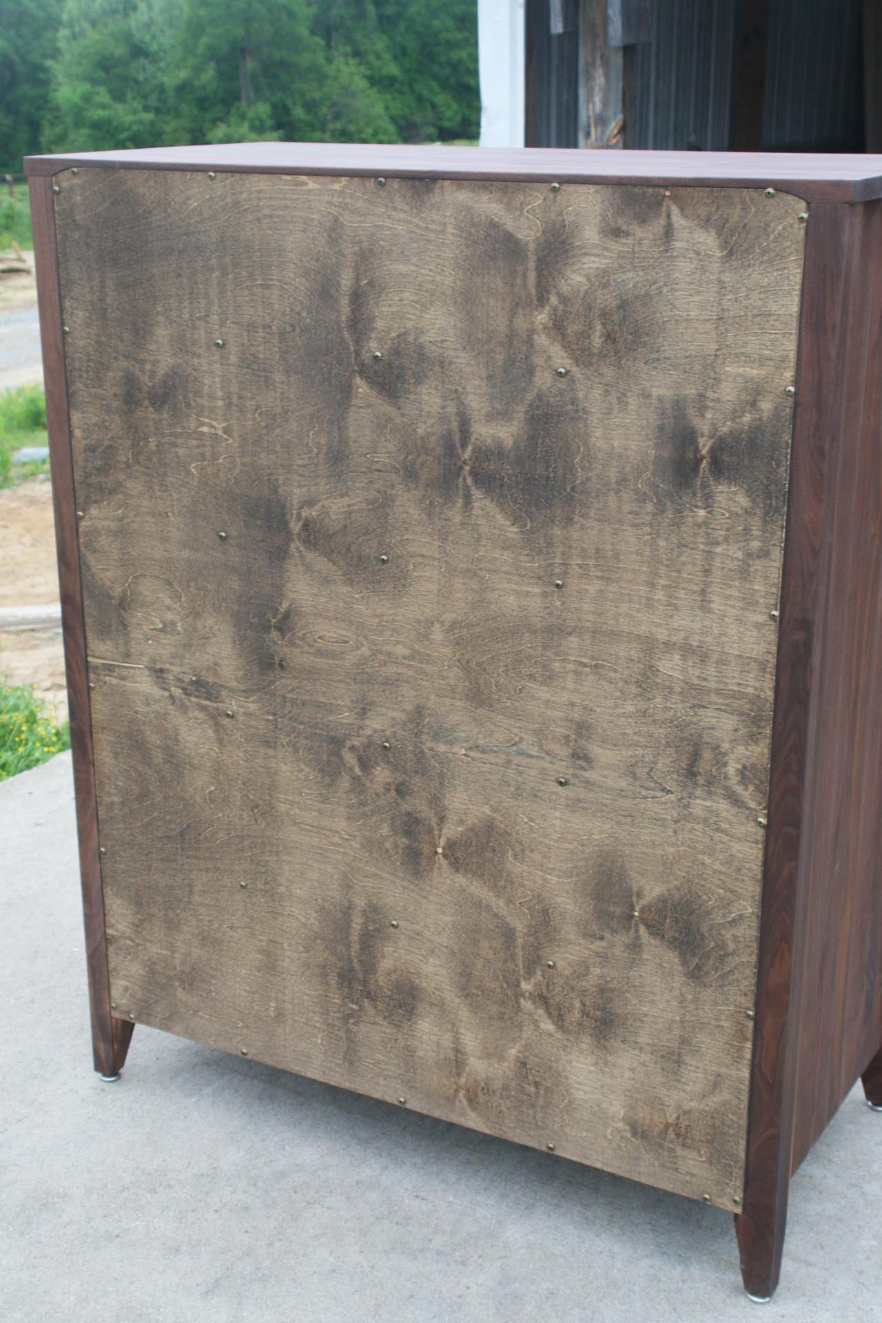 back of natural hardwood dresser