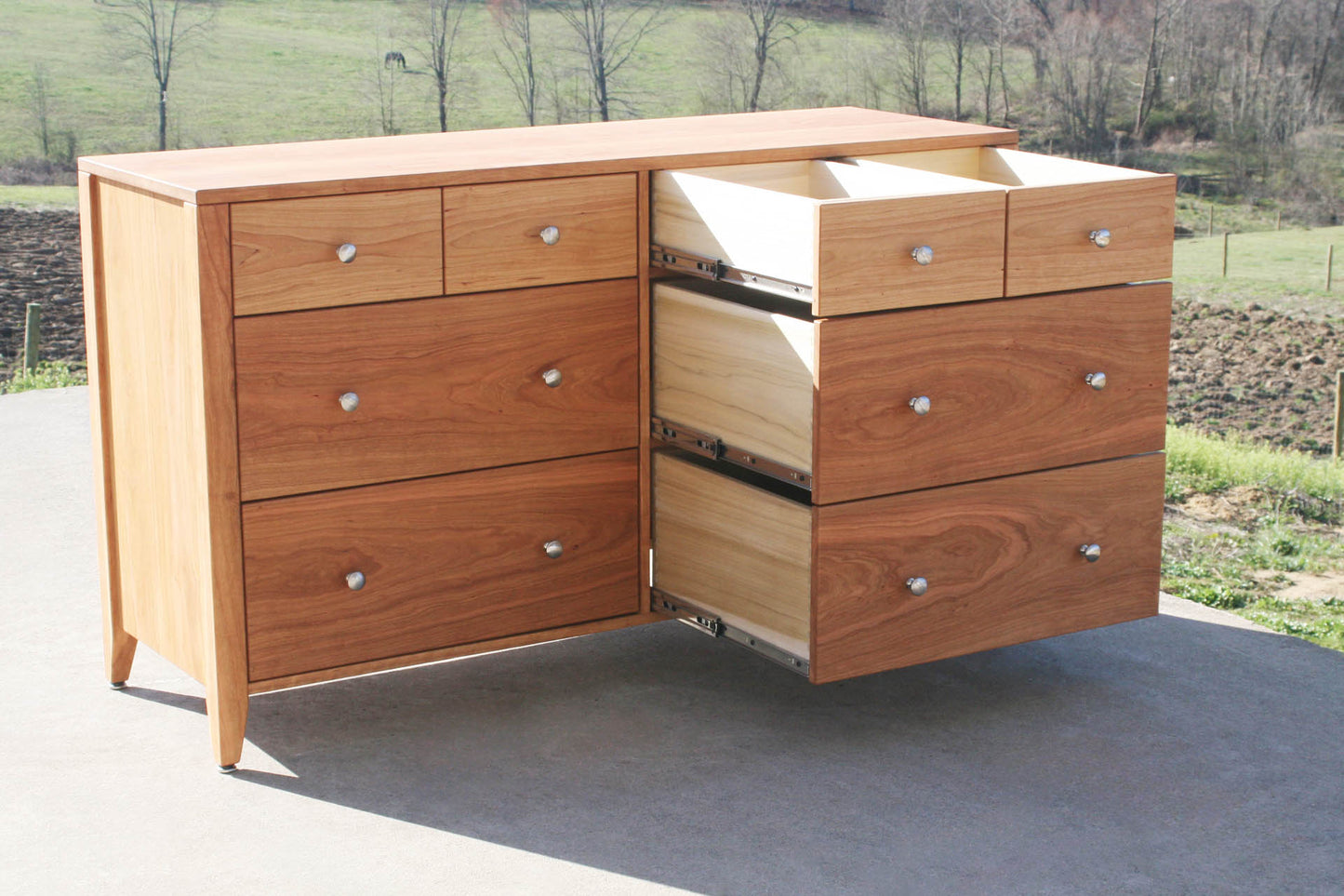 Double Dresser with some drawers open angled view