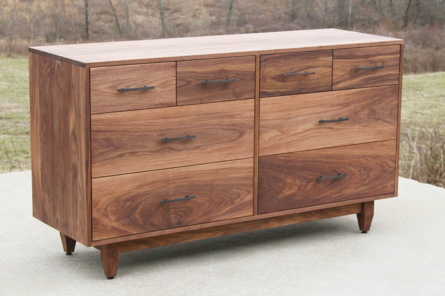 angled view walnut 8 drawer dresser