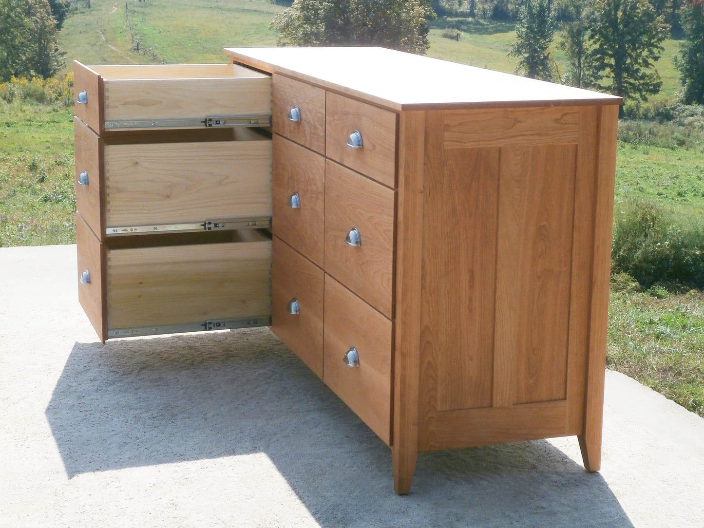 side view 9 Drawer Dresser with Flat Paneled Ends and Overlap Drawers open