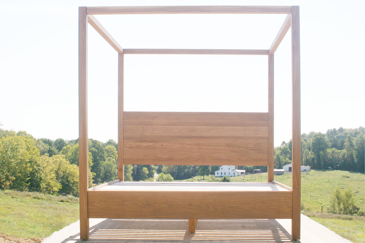 front view solid natural Canopy Bed with a square headboard