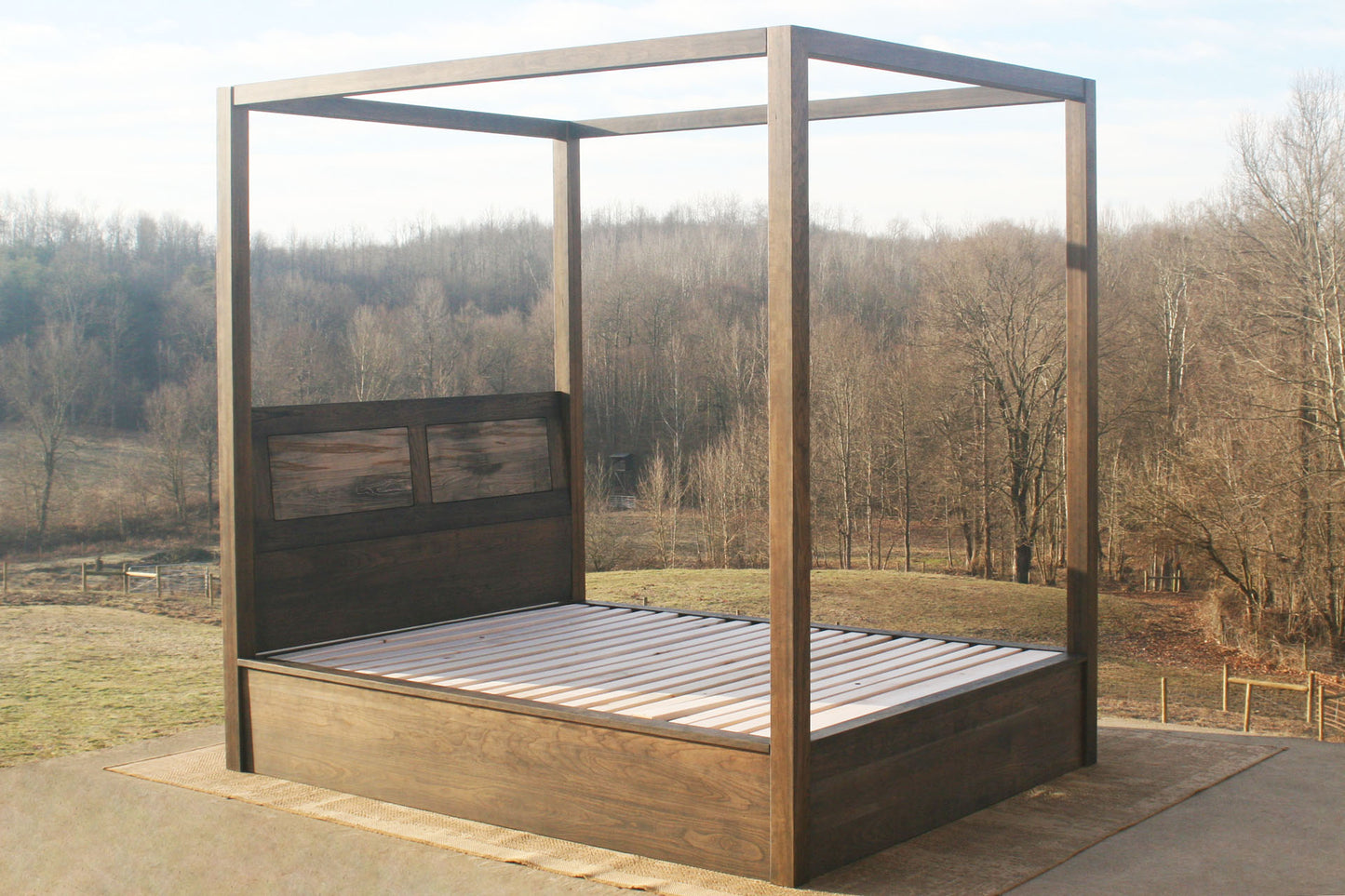solid Canopy Bed with angled headboard and large rails side angled view