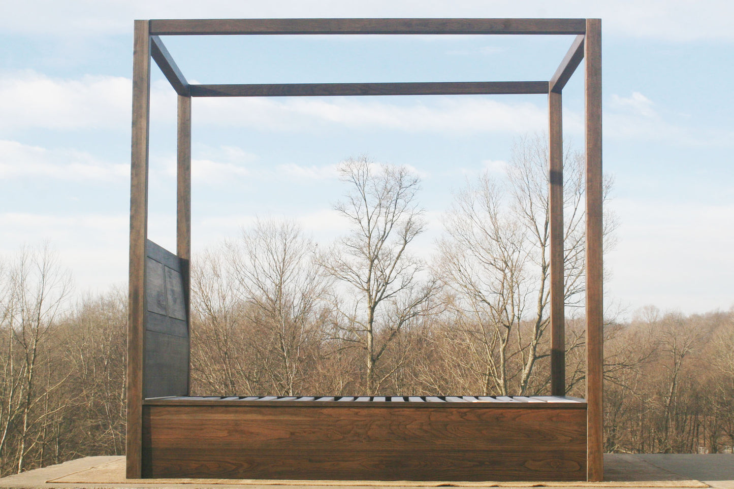 solid Canopy Bed with angled headboard and large rails side view