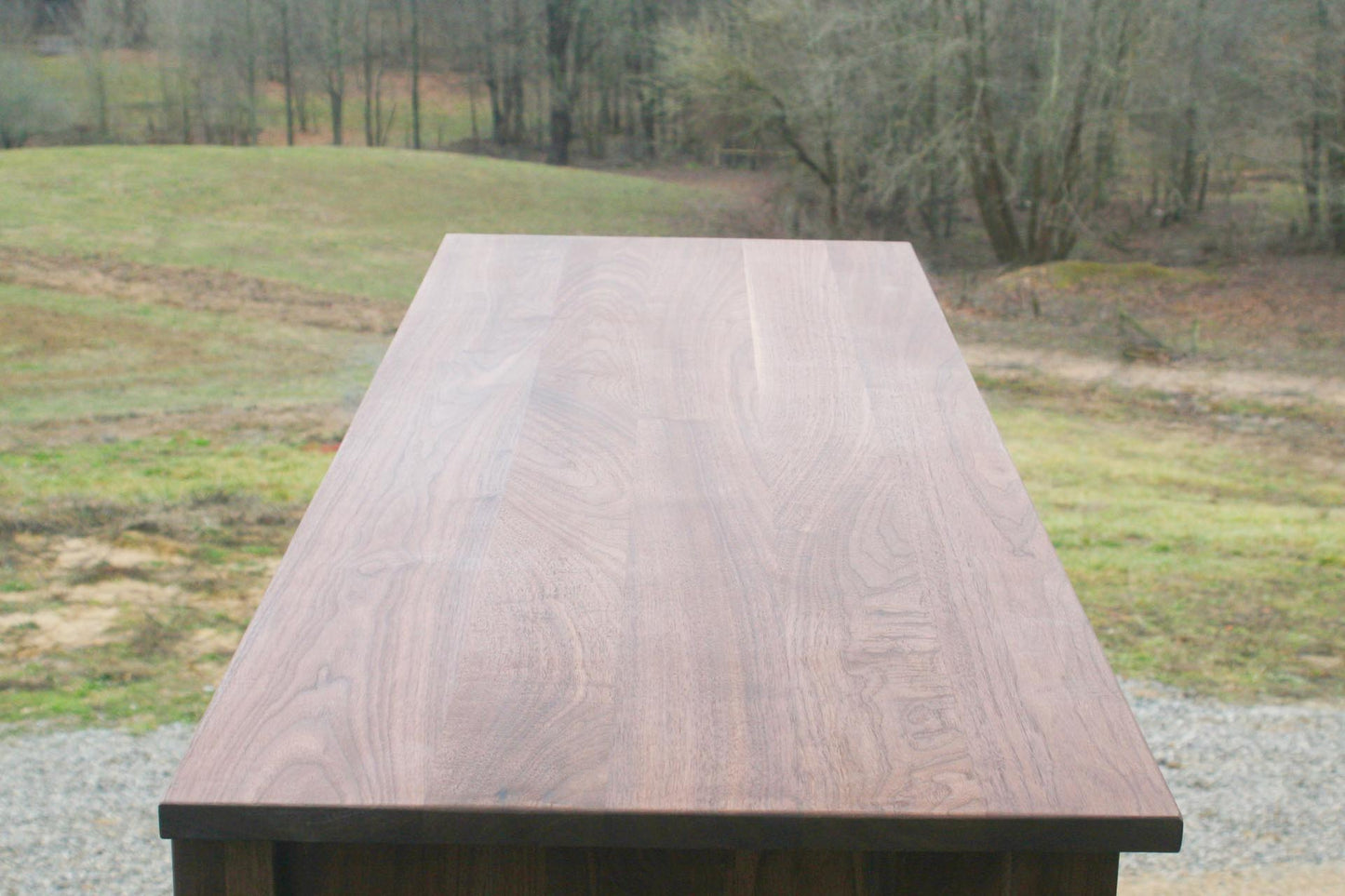 top of Walnut entertainment console