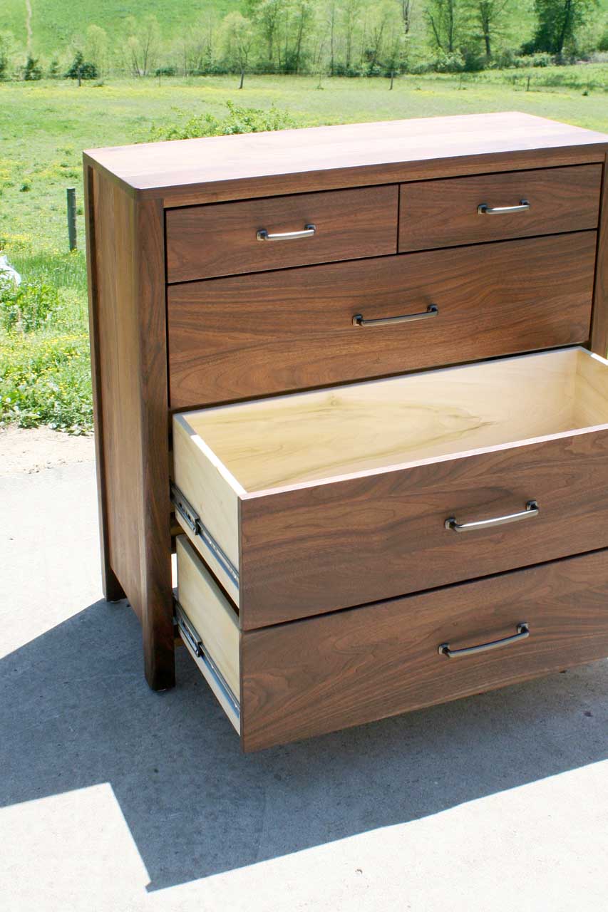 hardwood five drawer bottom dresser angled view two drawers open