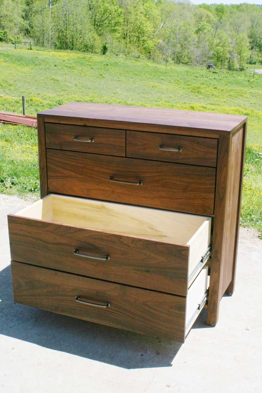 hardwood five drawer bottom dresser two drawers extended