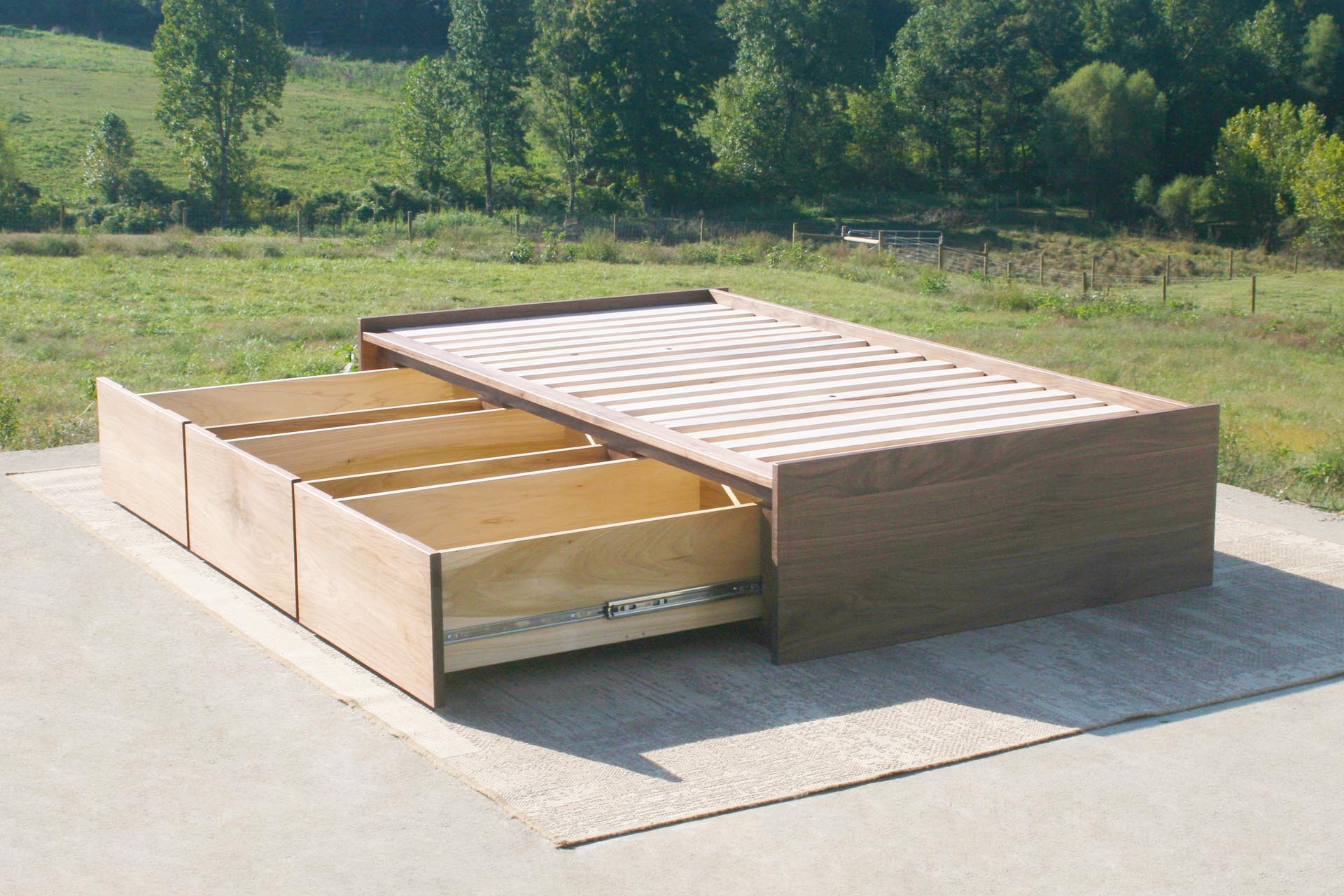 Low Storage Bed with 6 drawers angled view with drawers open