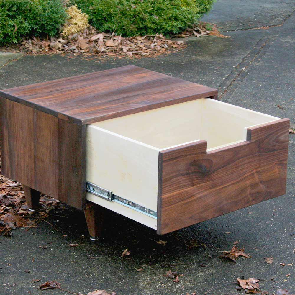 nightstand with a cut out drawer side view