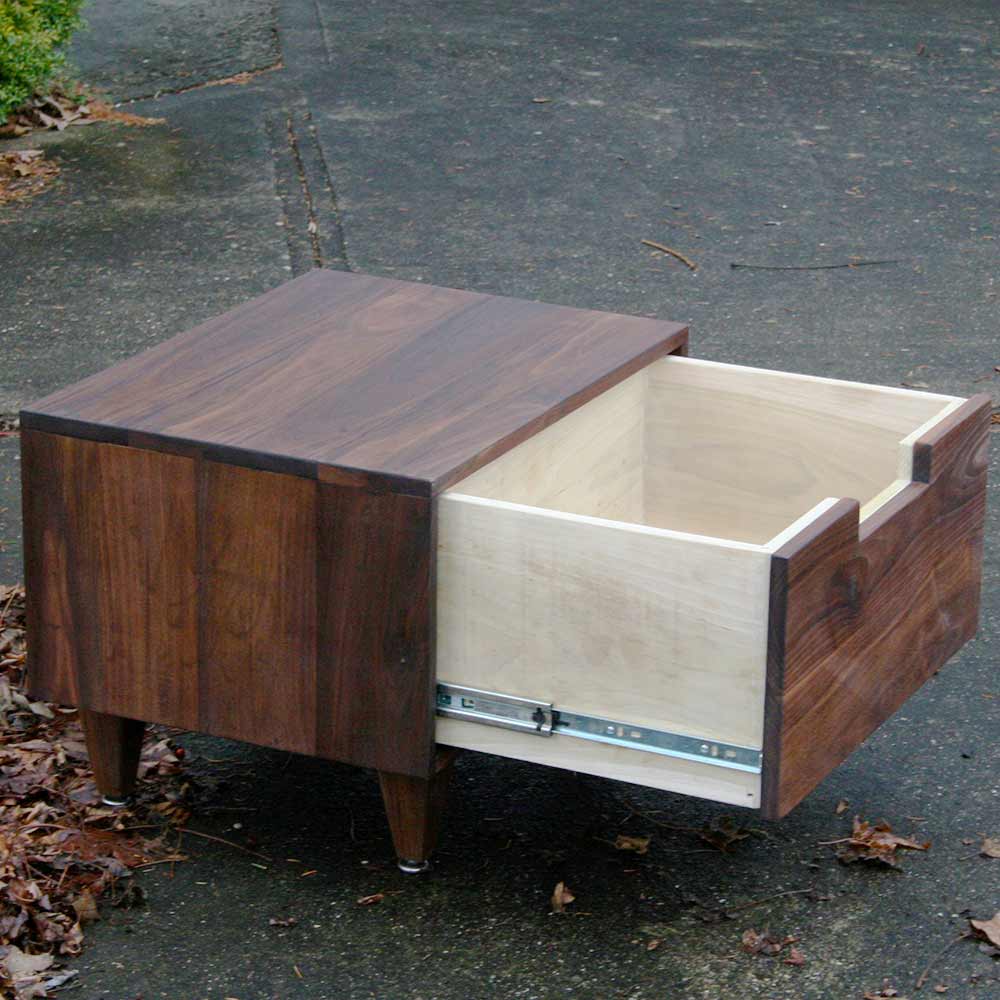 side view small nightstand with cut out drawer out