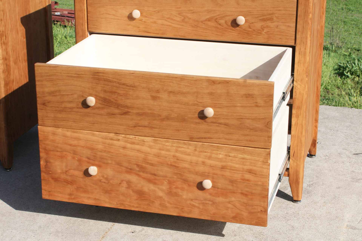 close up drawer open 3 drawer nightstand