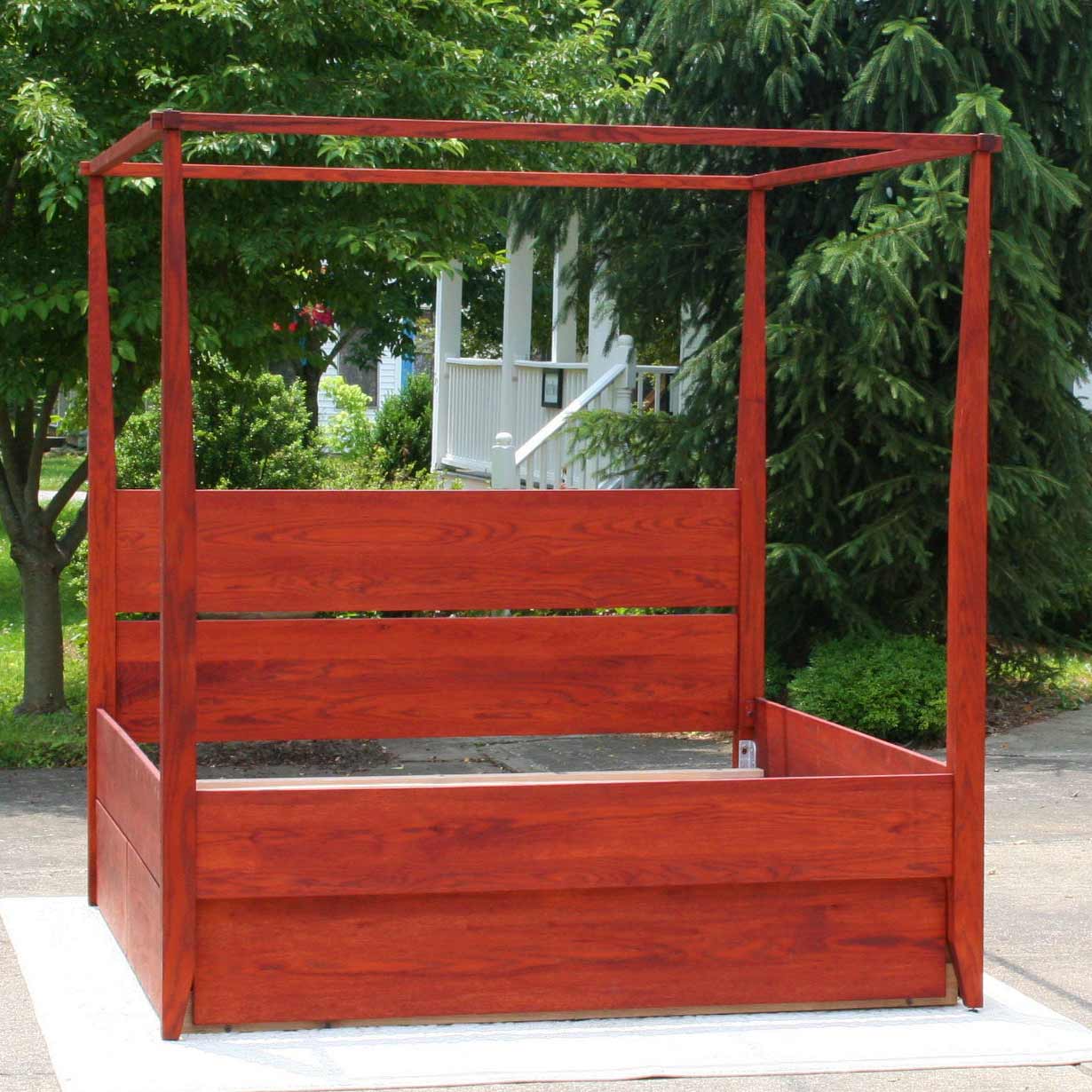 canopy bed with headboard and 4 drawers box spring base front view