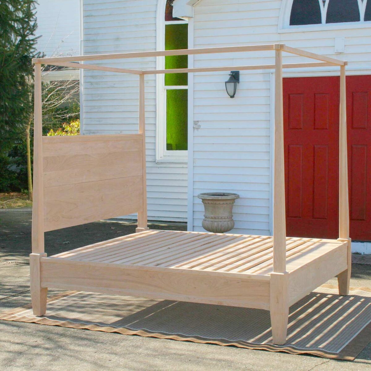 canopy bed with tapered posts side view