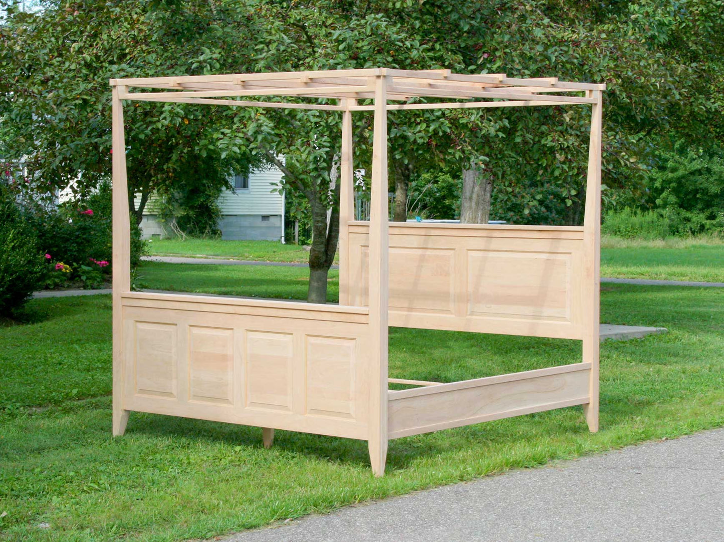 Paneled Canopy Bed with a Box Spring base side angled view