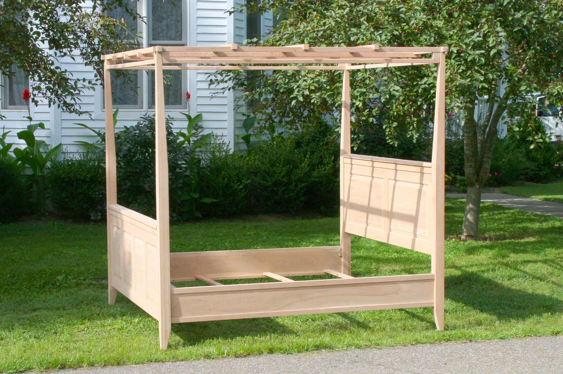 canopy bed with paneled head and footboard tapered posts box spring base options for top rails and finials side view