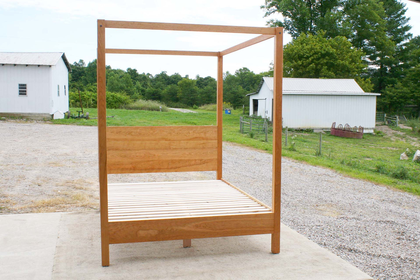 natural canopy bed with straight posts and top rails front view