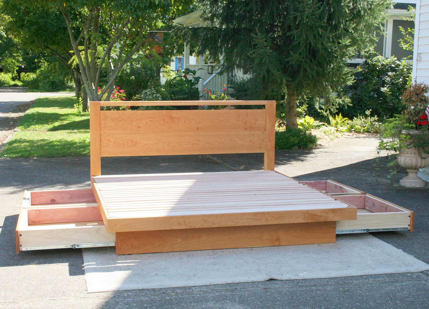 drawers open Platform bed with 4 drawers and headboard with top bar