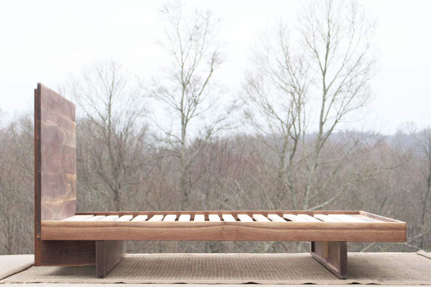 cantilever platform bed with headboard side view