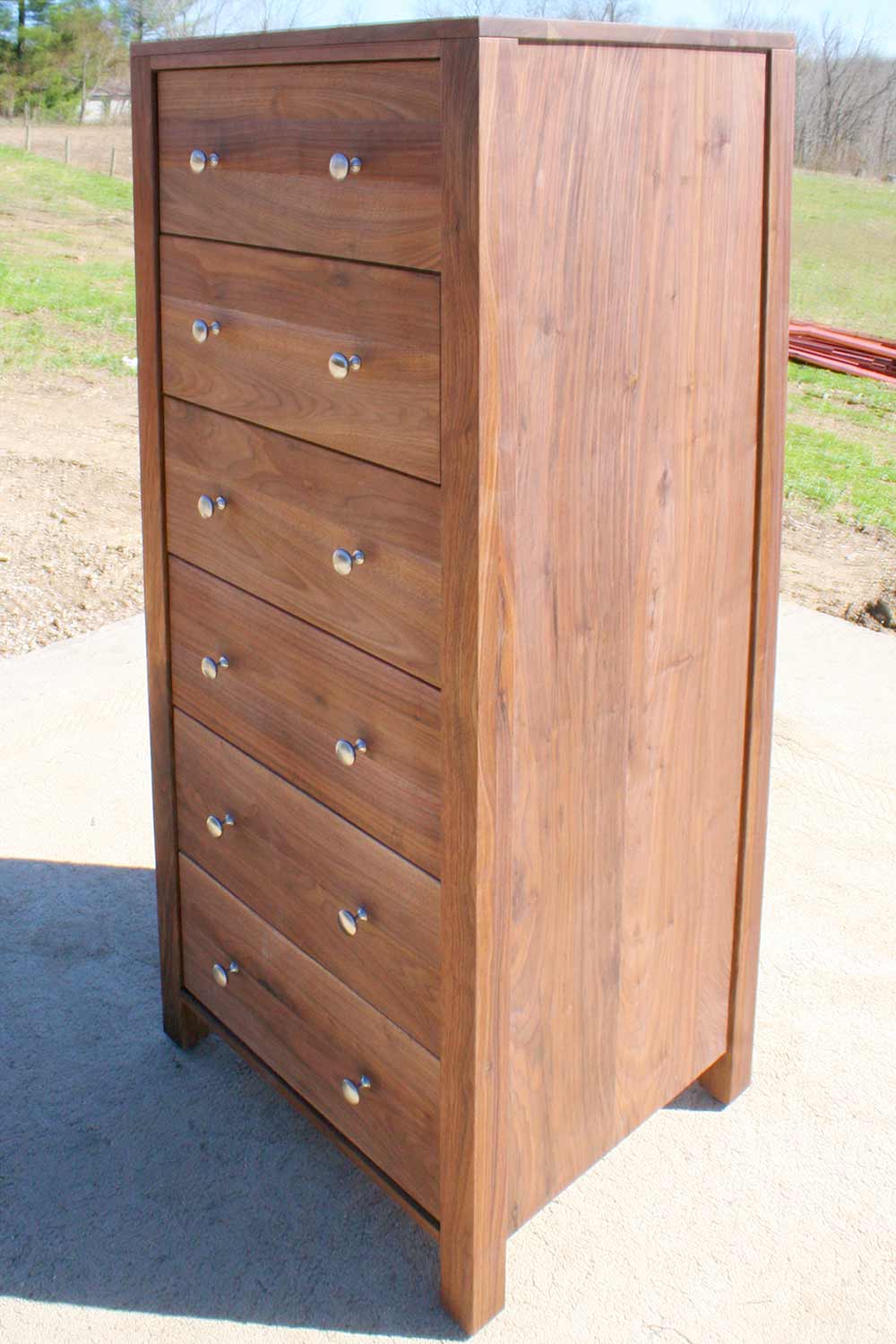 angle view tall walnut dresser