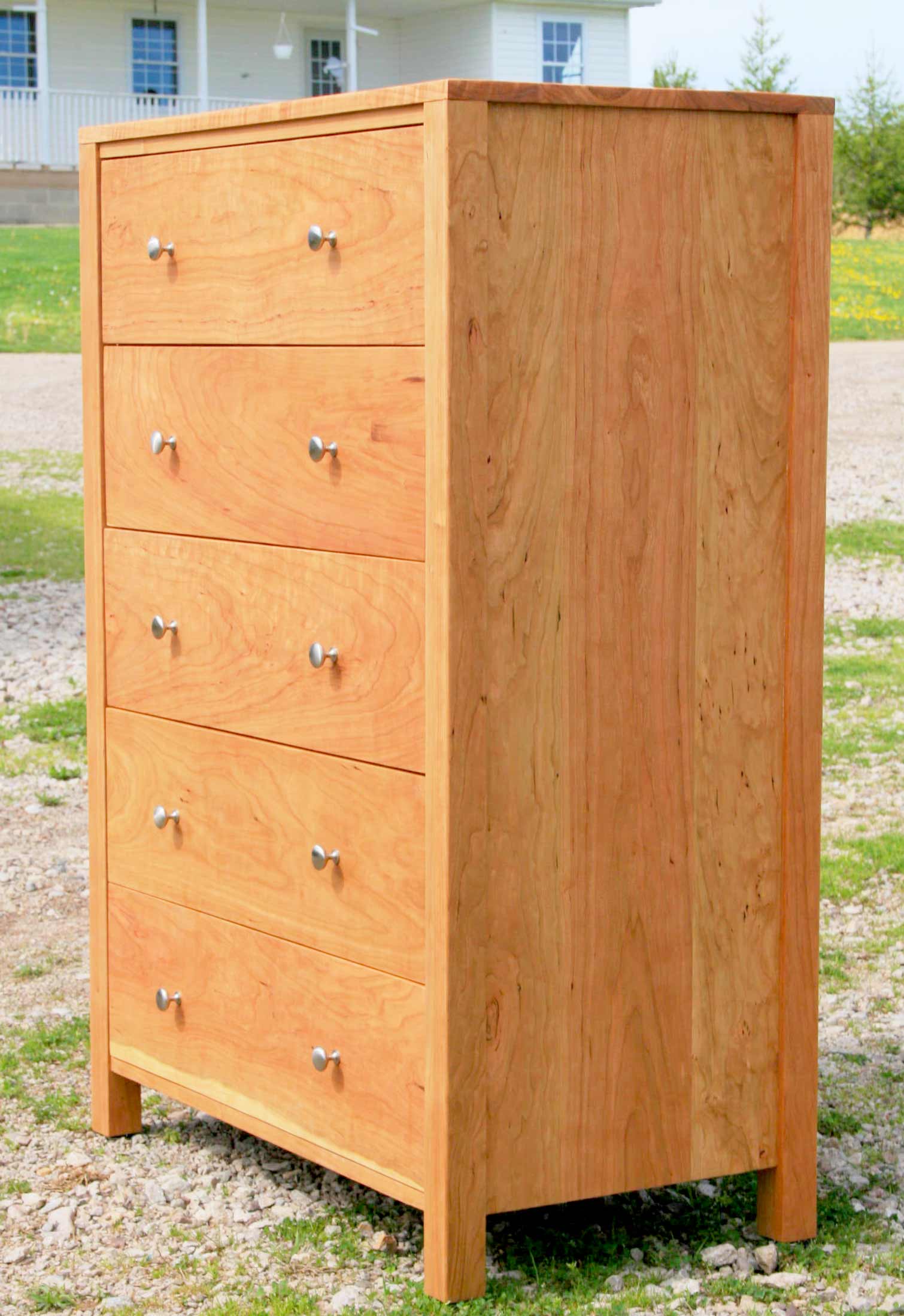 angled view walnut dresser with nickel pulls hardwood