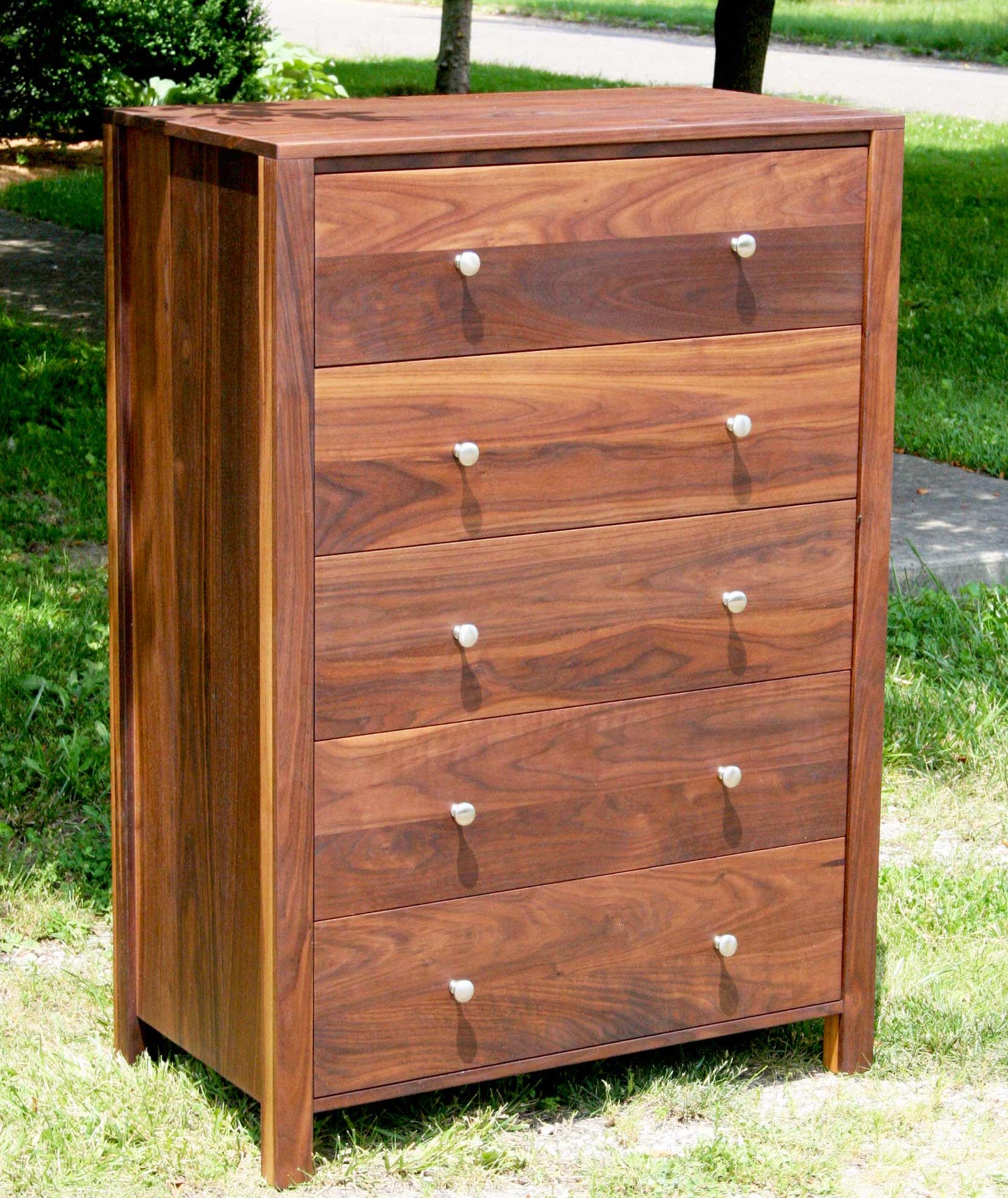 walnut dresser with nickel pulls angled view
