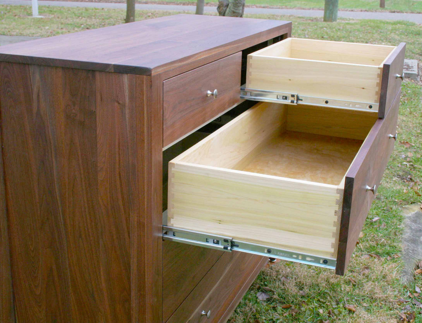 dresser-with-5-inset-drawers-and-corner-posts some drawers open side view