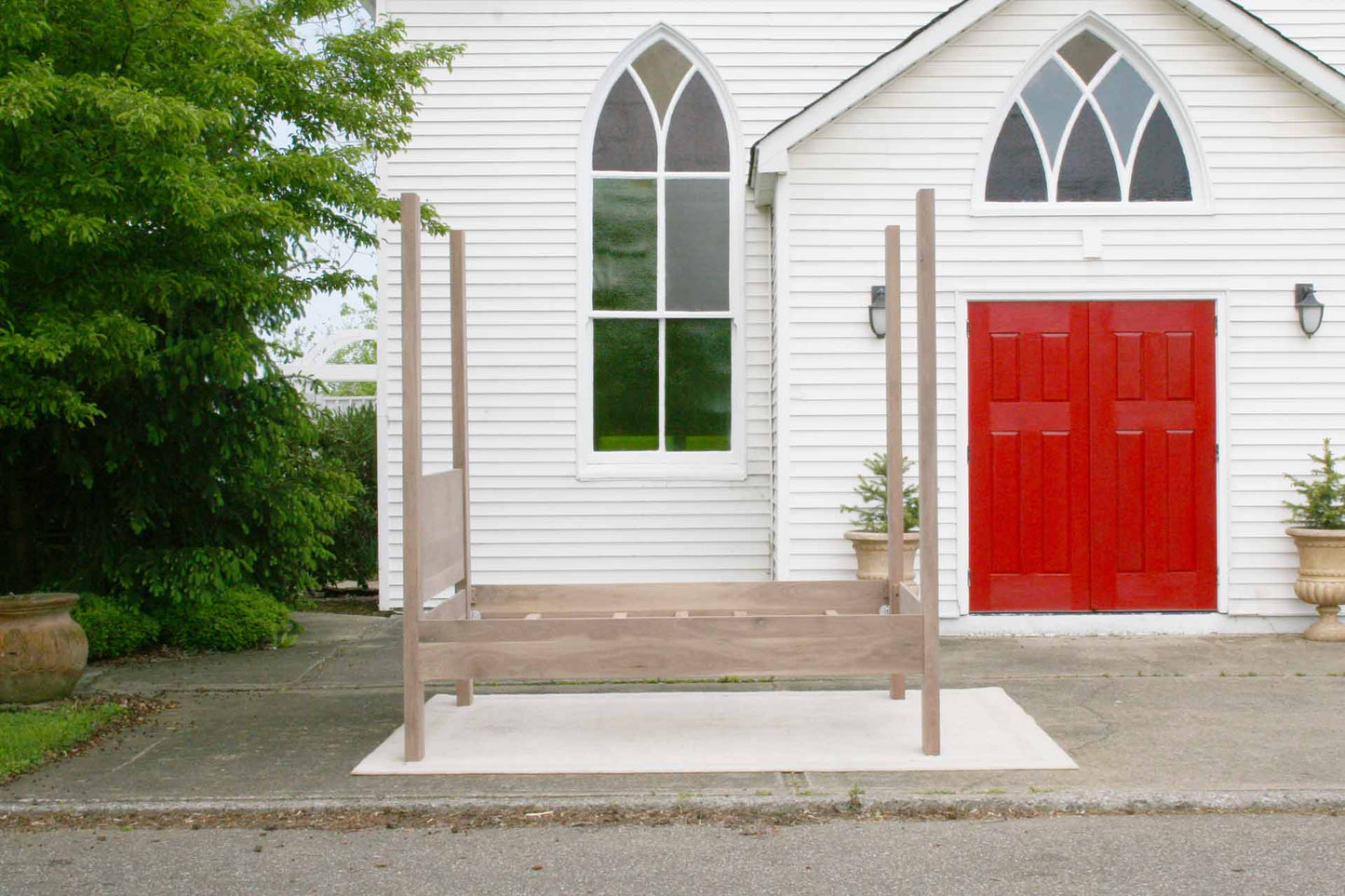 modern four poster bed side view
